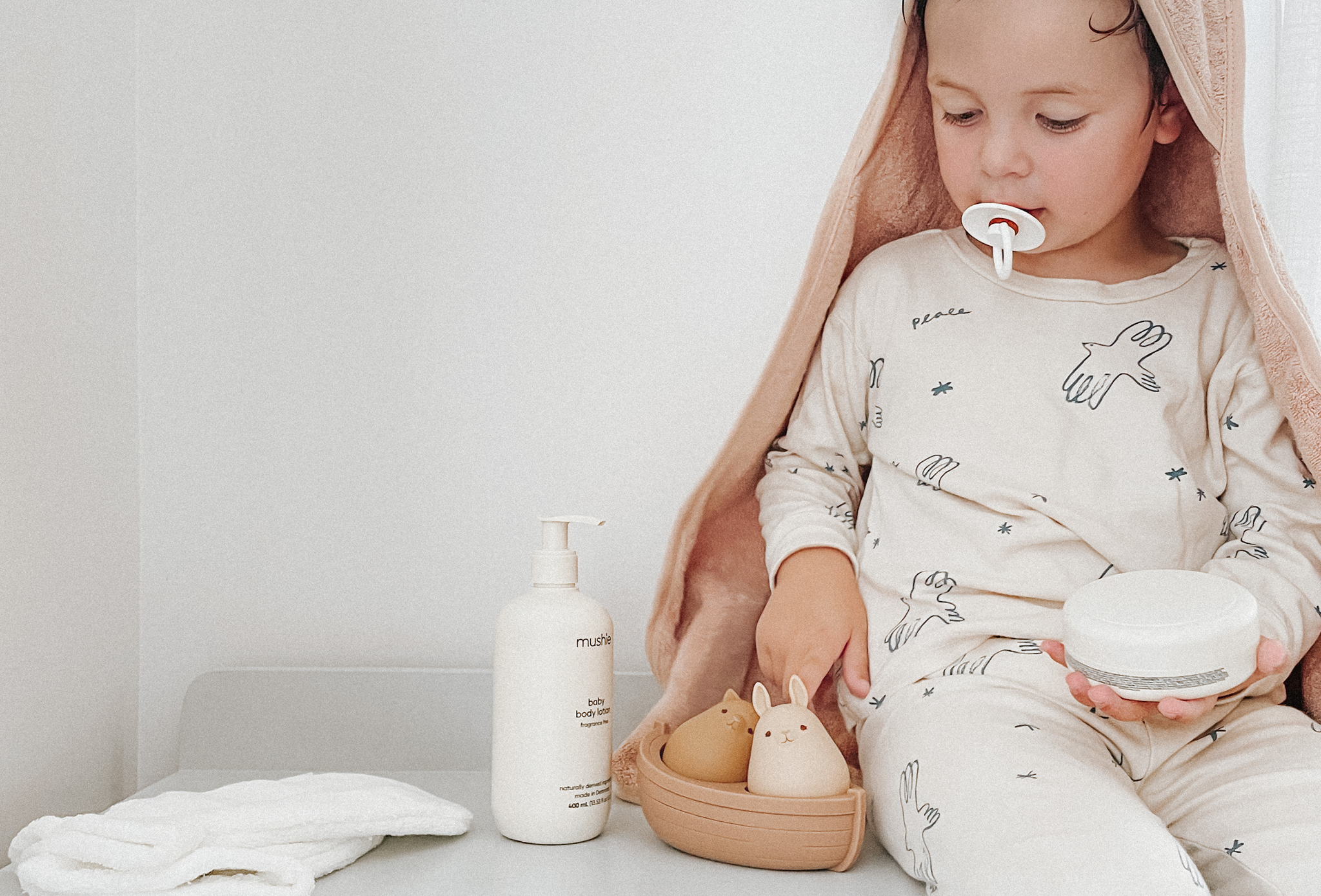 Make a splash at bath time with our adorable range of bath toys, towels, wash cloths, and mats. Babies, children and parents are sure to fall in love with our squishy ducks, stylish bath mats, and cuddly organic cotton towels.