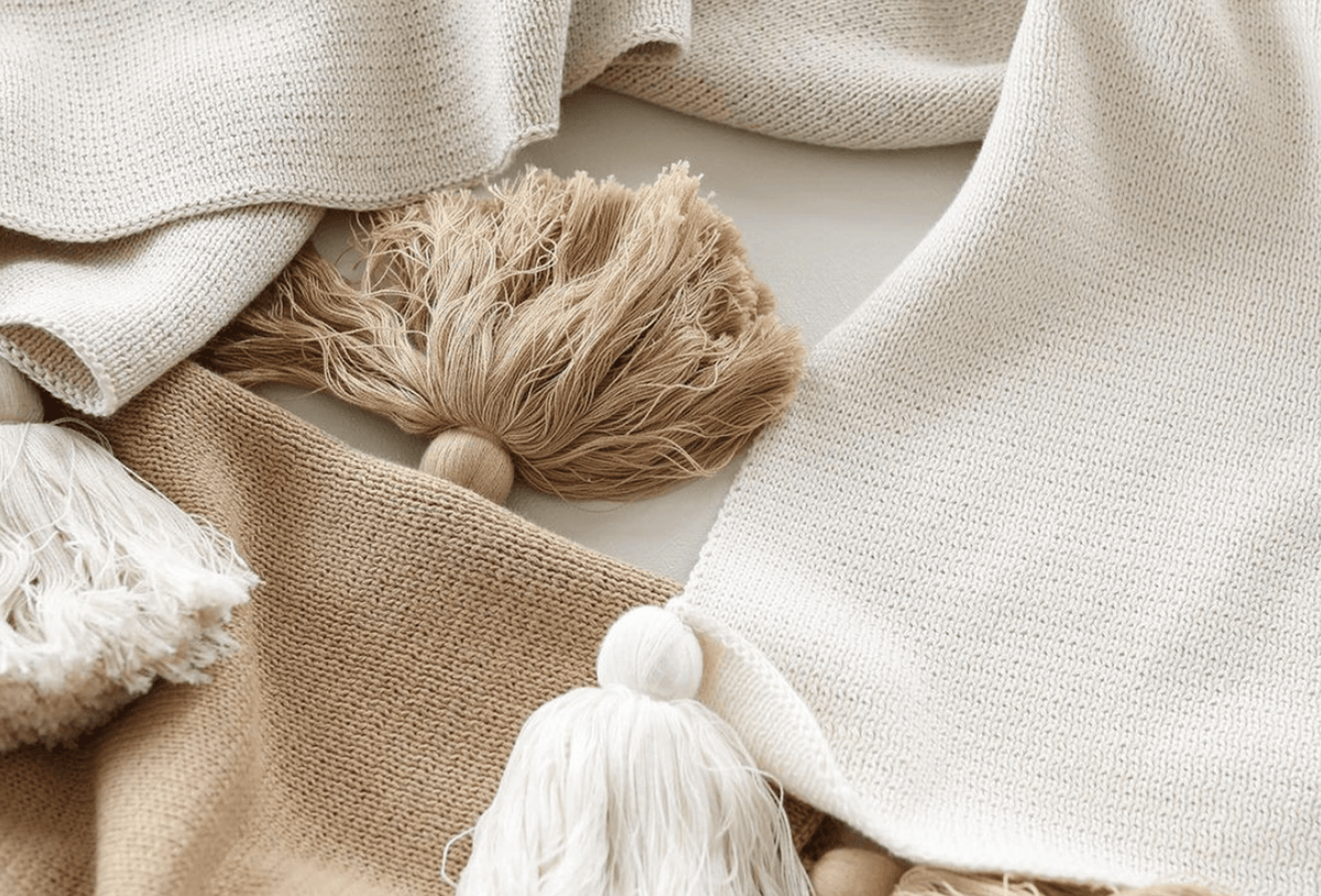 Beautiful baby bedding including knit blankets and cot sheets. Shop online or in store. 
