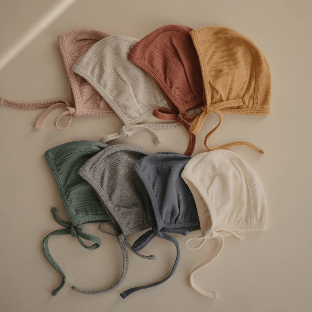 Mushie Ribbed Baby Bonnet - Cedar